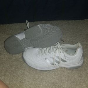 Adidas volleyball or other court shoes.